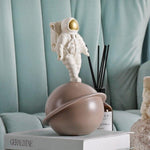 Statue Astronaute Saturne Or